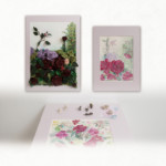 薔薇^o^バラ^_^ばら<br />
山口 律子 Rtsuko Yamaguchi<br />
初めに頭に浮かんだのが、赤い薔薇でした。如何してかな〜って。「カルメンが口にくわえて、踊っているから」とか「バラが咲いた〜」とか。私やっぱり単純かも、でも私は彫金で薔薇シリーズ作っているから……かも、とかくそこに赤をおきたくなる…と言うわけで今回は水彩で薔薇の下絵を描き和紙と金属でコラボしてみました。
